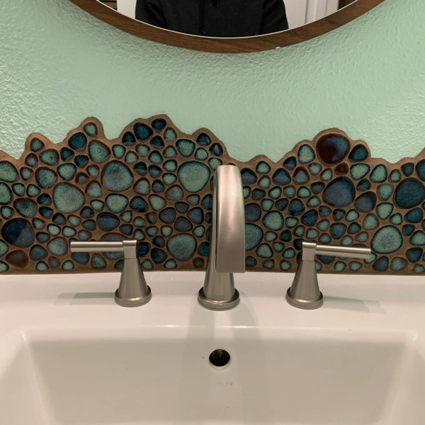 Ceramic Mosaic Pebble Tile Backsplash in Bathroom